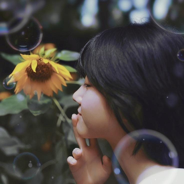 Kaveri Mehta, Lead Design Curator at PanelBeaconLoom, reviewing corporate floral arrangements